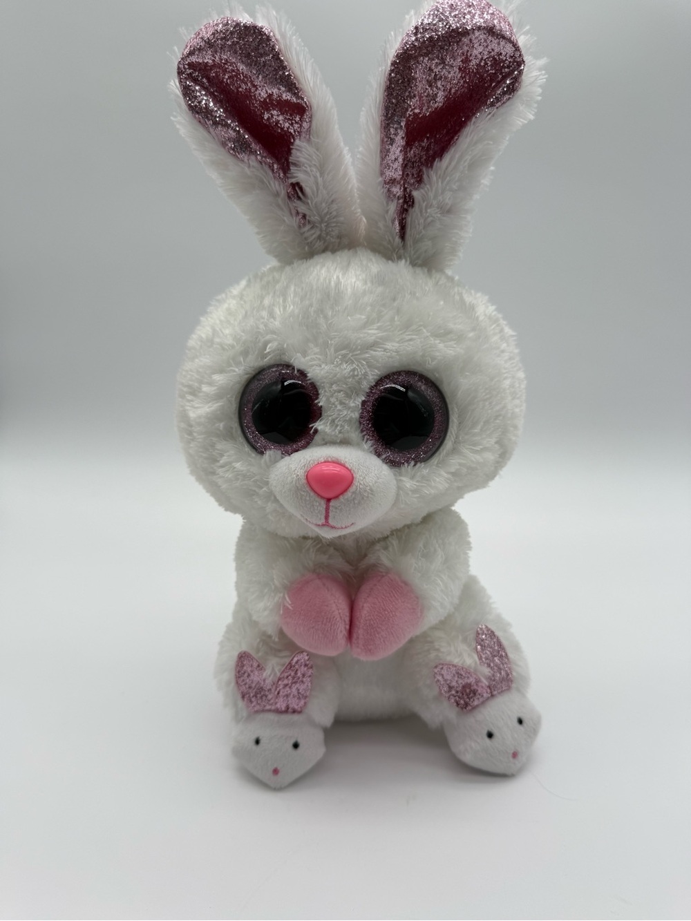 Ty Slippers White Plush Bunny with Pink Glitter Accents
A7